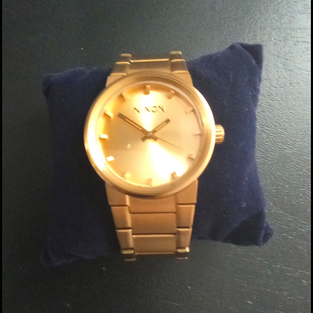 Gold mens nixon watch